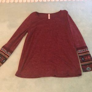 Size L dressy t shirt with embroidered sleeves.